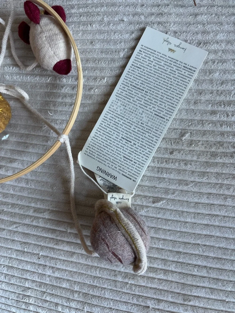Konges Sloejd Neutral Cotton Hanging Mobile with Gold and Beige Accents